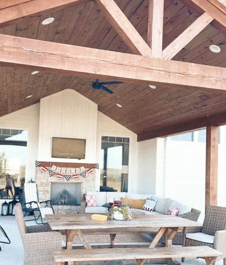 Farmhouse Outdoor Porch With TV