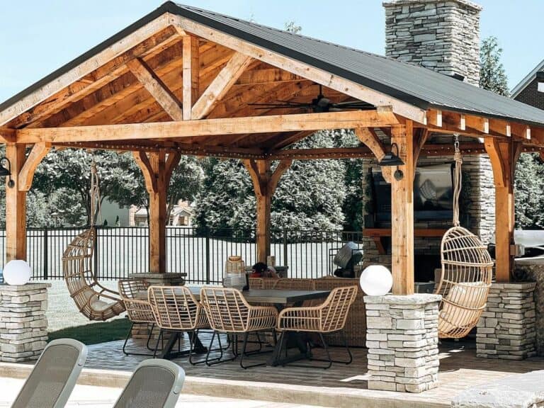 Farmhouse Backyard With Rattan Swings