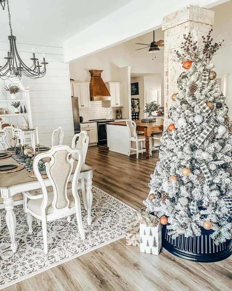 Flocked Christmas Tree with Black Metal Tree Skirt