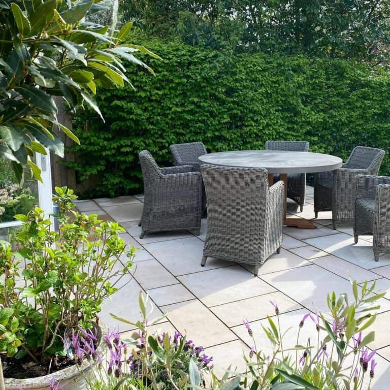 Concrete Patio Décor With Gray Wicker Furniture