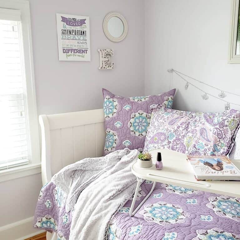 Colorful Bedding and White Bed Frame
