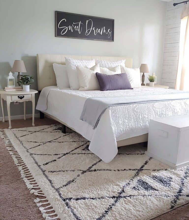 Tasseled Rug Layered Over Carpet
