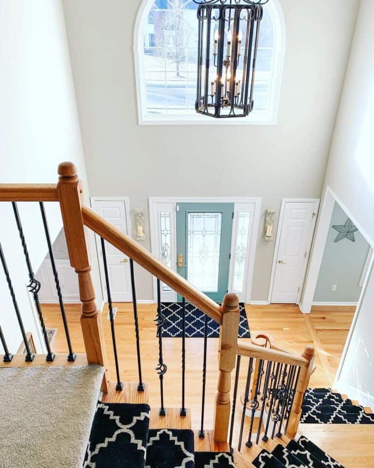 Two-story Foyer with Black Metal Pendant Lighting
