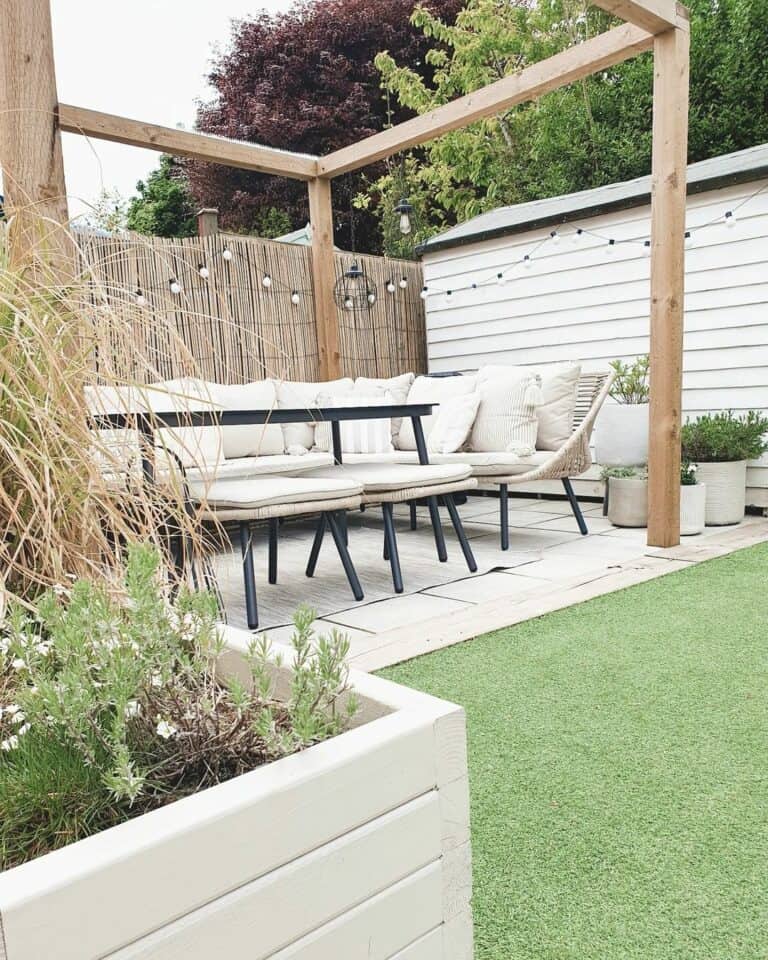 Light Wood Outdoor Pergola With Beige Wicker Sectional