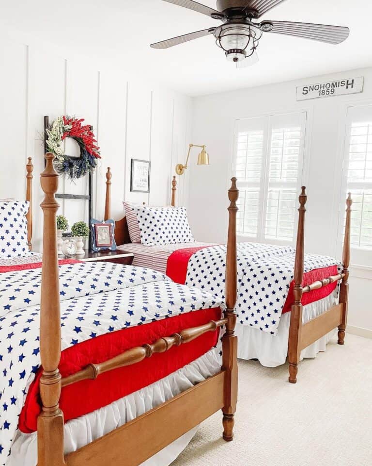 Bedroom with Two Wood Four Poster Beds