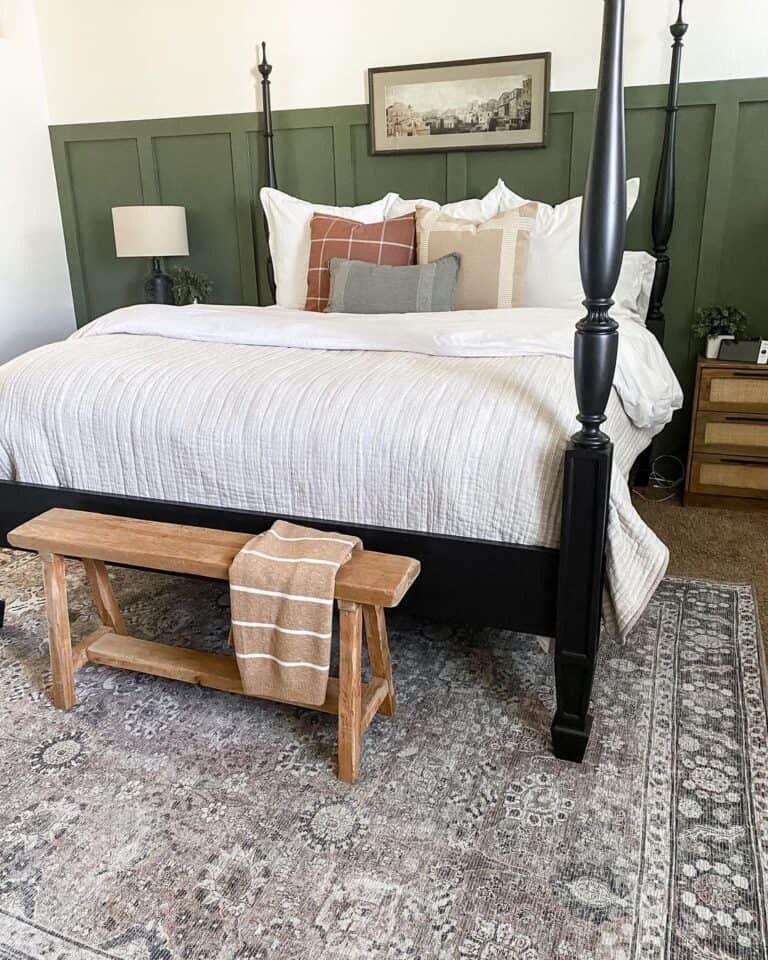 Green Board and Batten Wall with Black Four Poster Bed