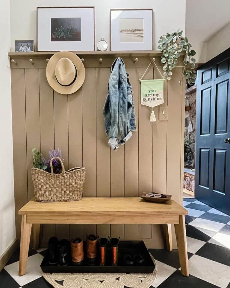 Checkerboard Mudroom with Beige Shiplap Half Wall