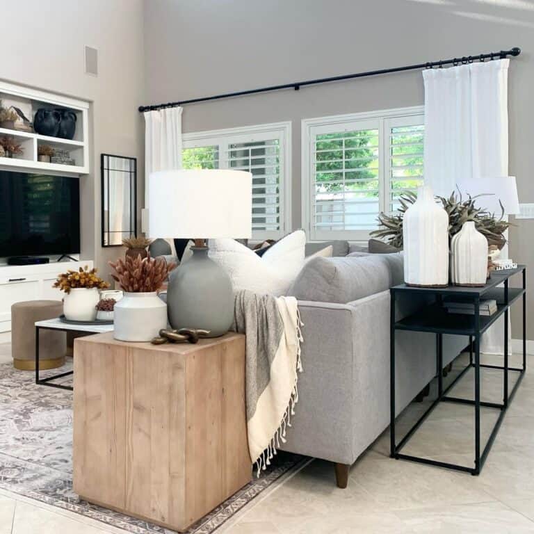 Grey Farmhouse Living Room with White Curtains