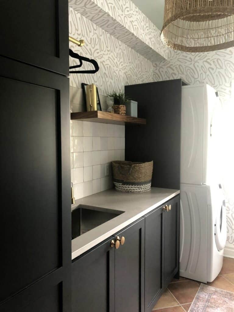 All Black Cabinets Meet Whimsical Wallpaper