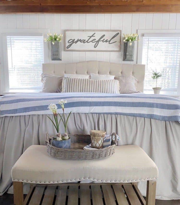 Classical Bedroom With a Blue and White Blanket