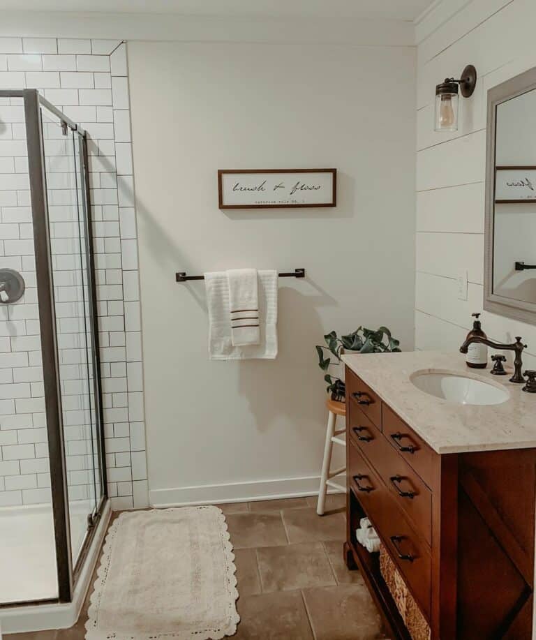 Charming Farmhouse Bathroom With Large Glass Shower Door