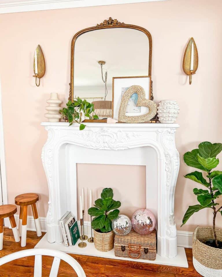 Rose Pink Walls With Leaf Sconces