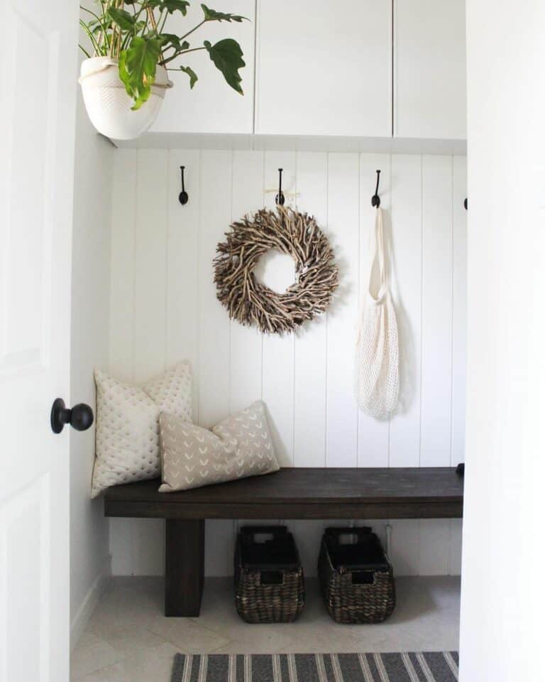 White Mudroom With Wooden Bench