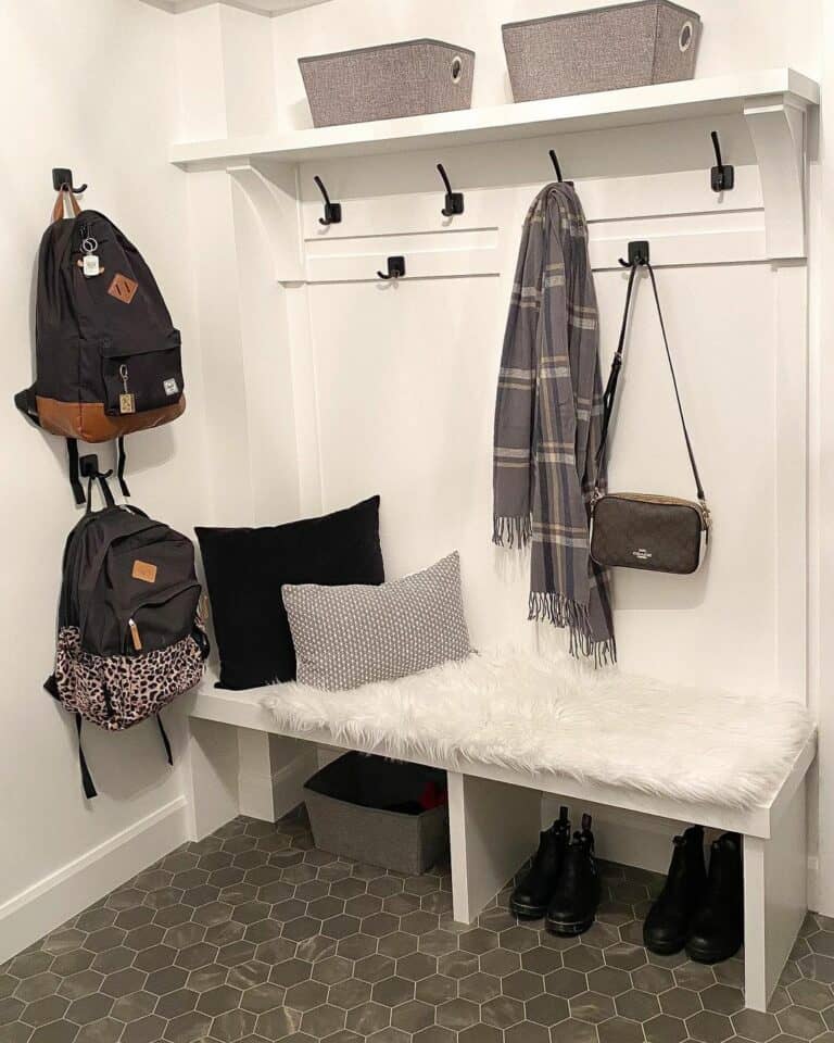 Modern Black and White Mudroom With Wall Hooks