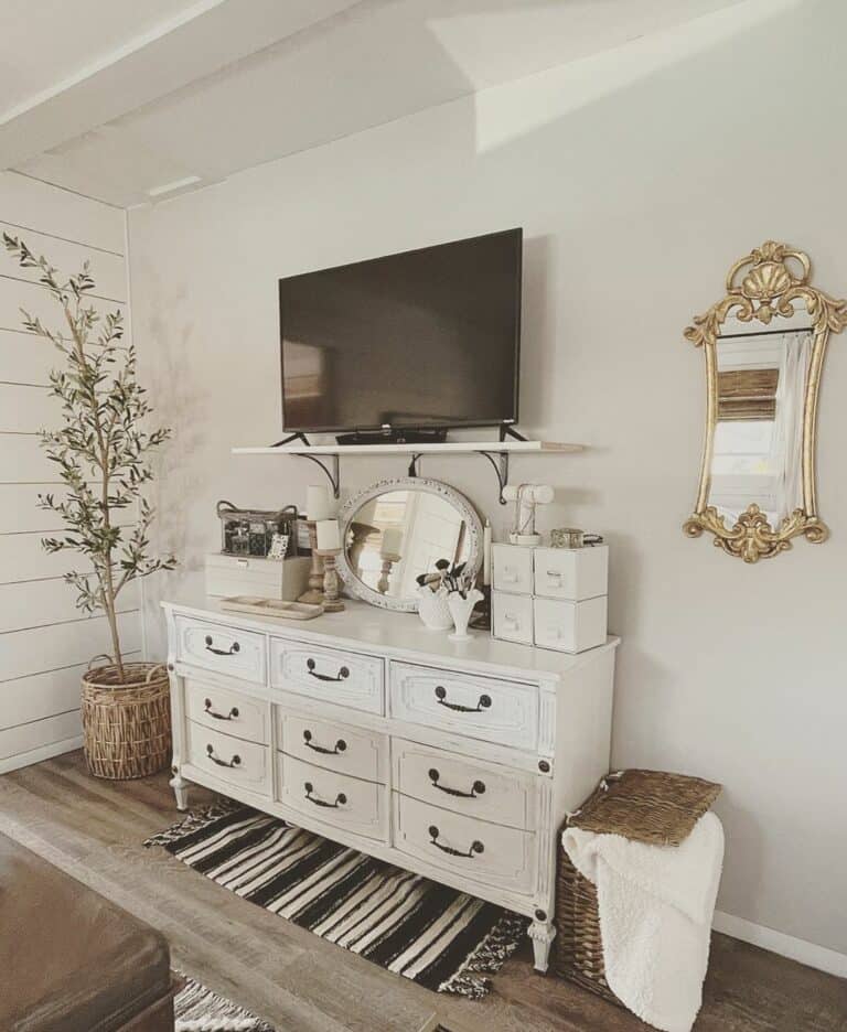Gold Mirror in White Farmhouse Bedroom