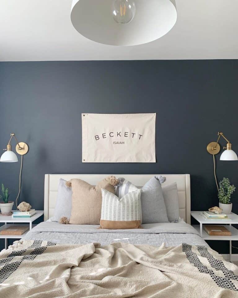 White Sconces on an Iron Ore Bedroom Wall