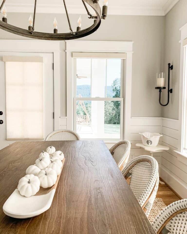 White Wicker Chairs Gathered Around a Table