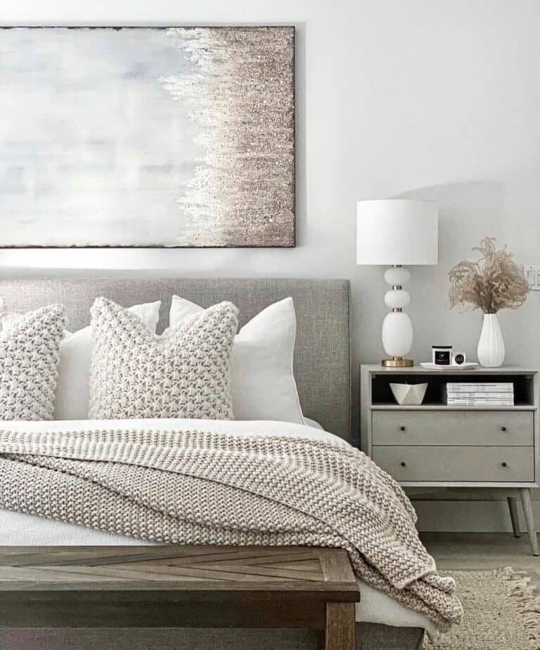 Farmhouse Bedroom With a Modern Painting