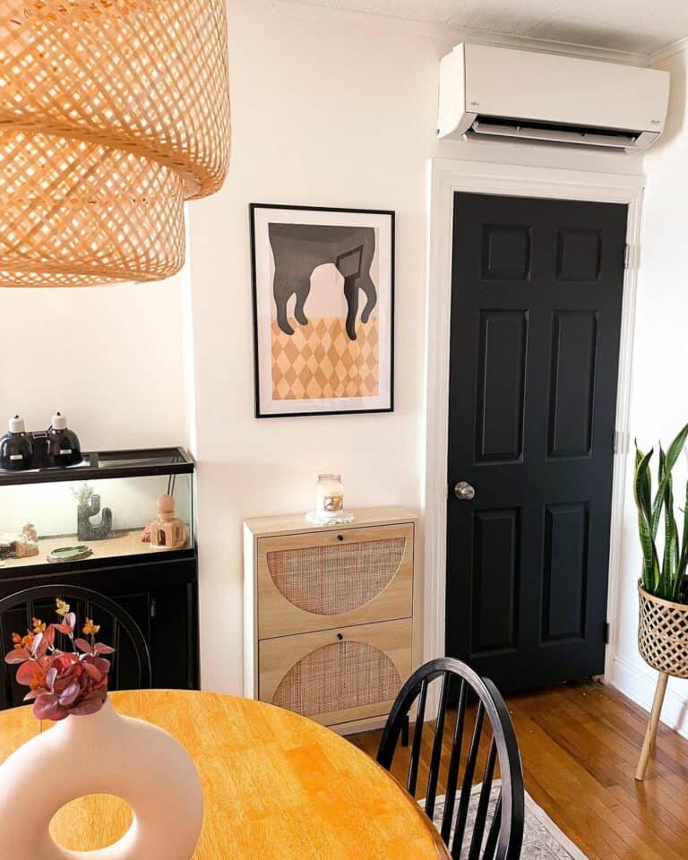 Modern Vase Centerpiece Beneath a Woven Chandelier