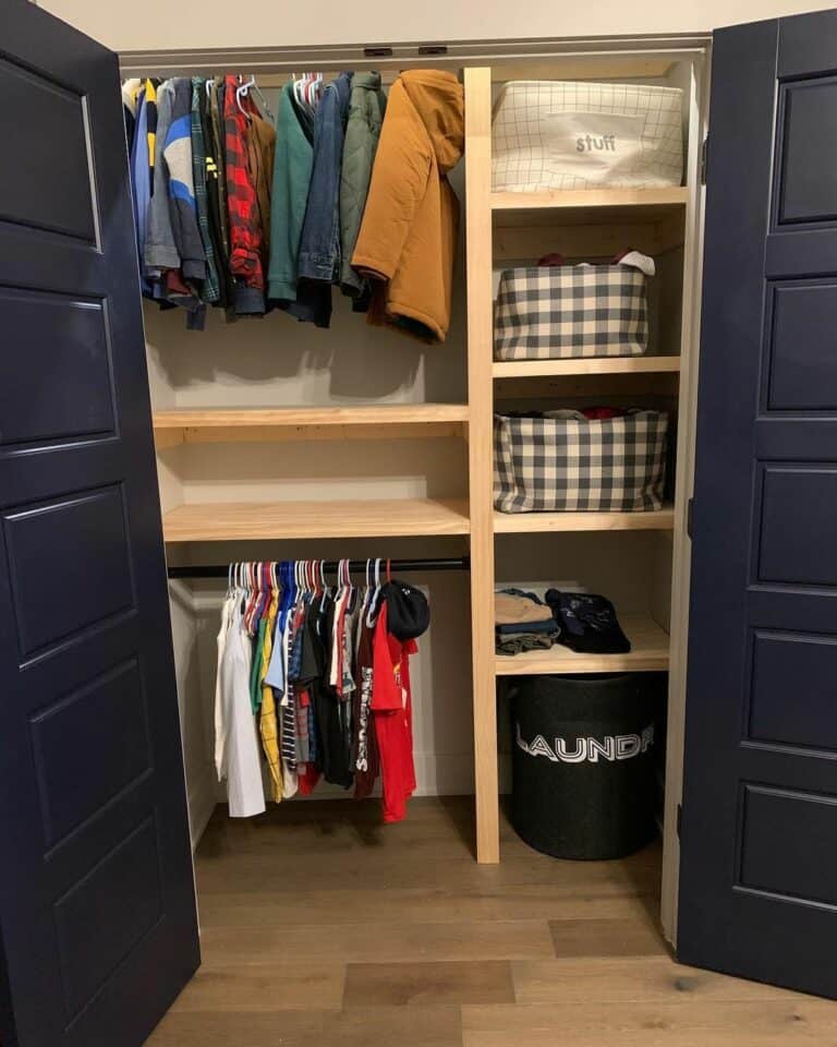 Closet Shelving Ideas With Woof Shelving and Black Doors