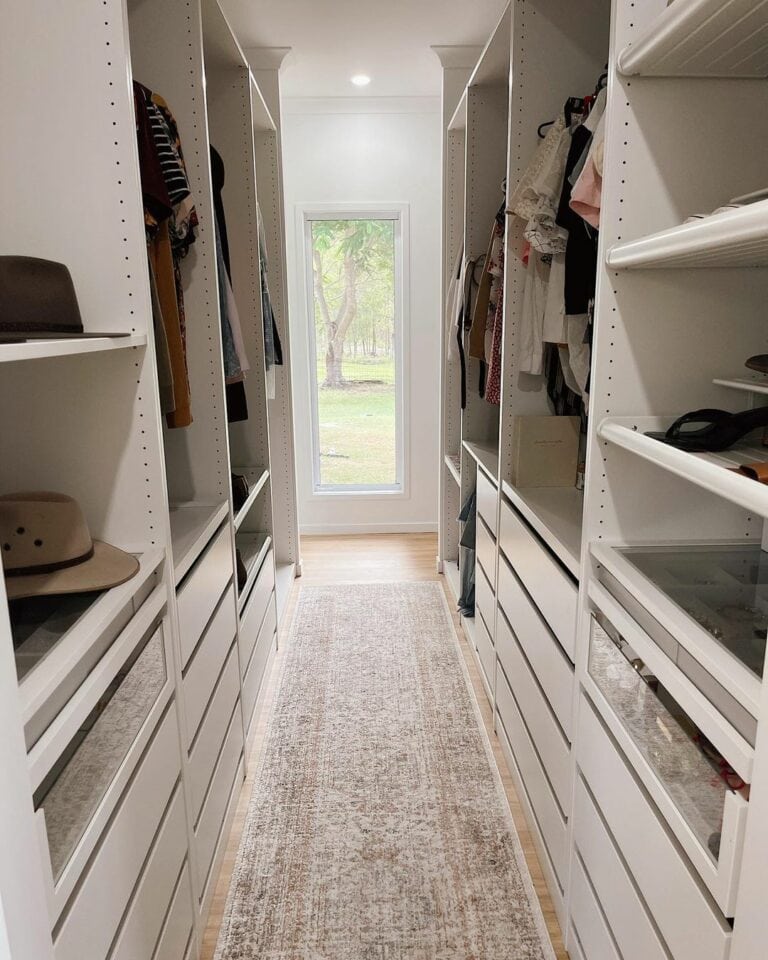Coastal Walk-in Closet With Maple Flooring