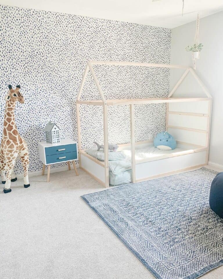 Speckled Accent Wall Behind an Original Bed