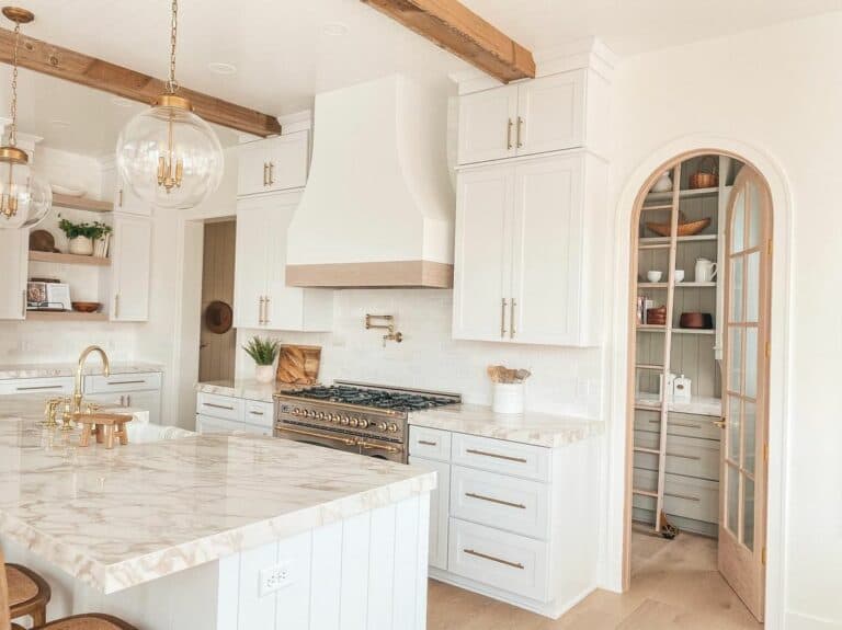 Arched Pantry Door and Exposed Wood Beams