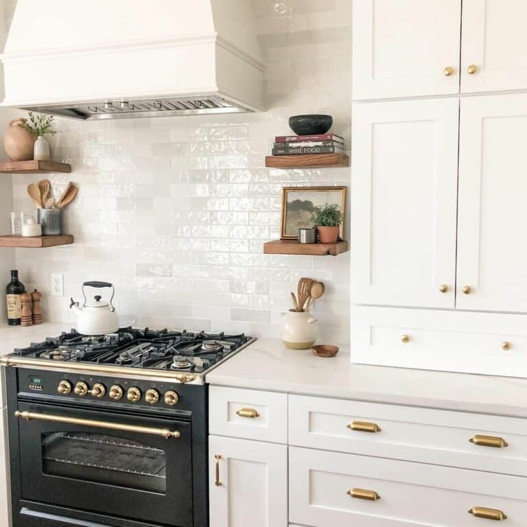 Gold Accents and White Stove Backsplash