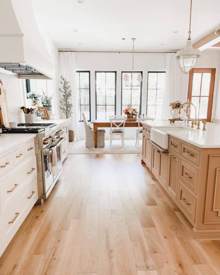 Farmhouse Sink Sits Within Wood Island