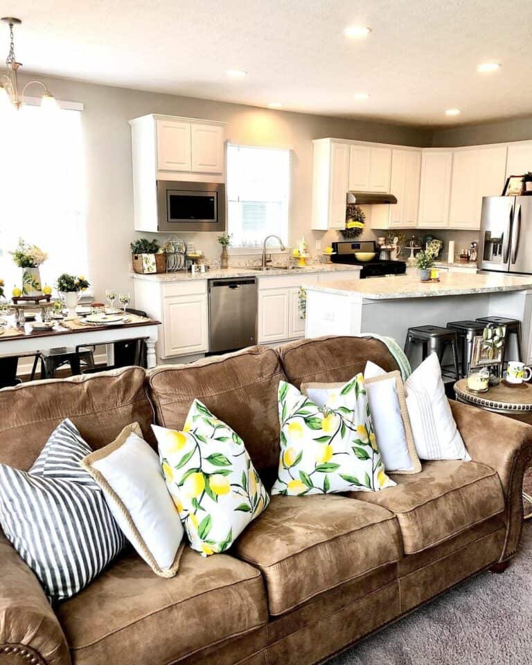 Brown Suede Couch With Lemon Accent Pillows