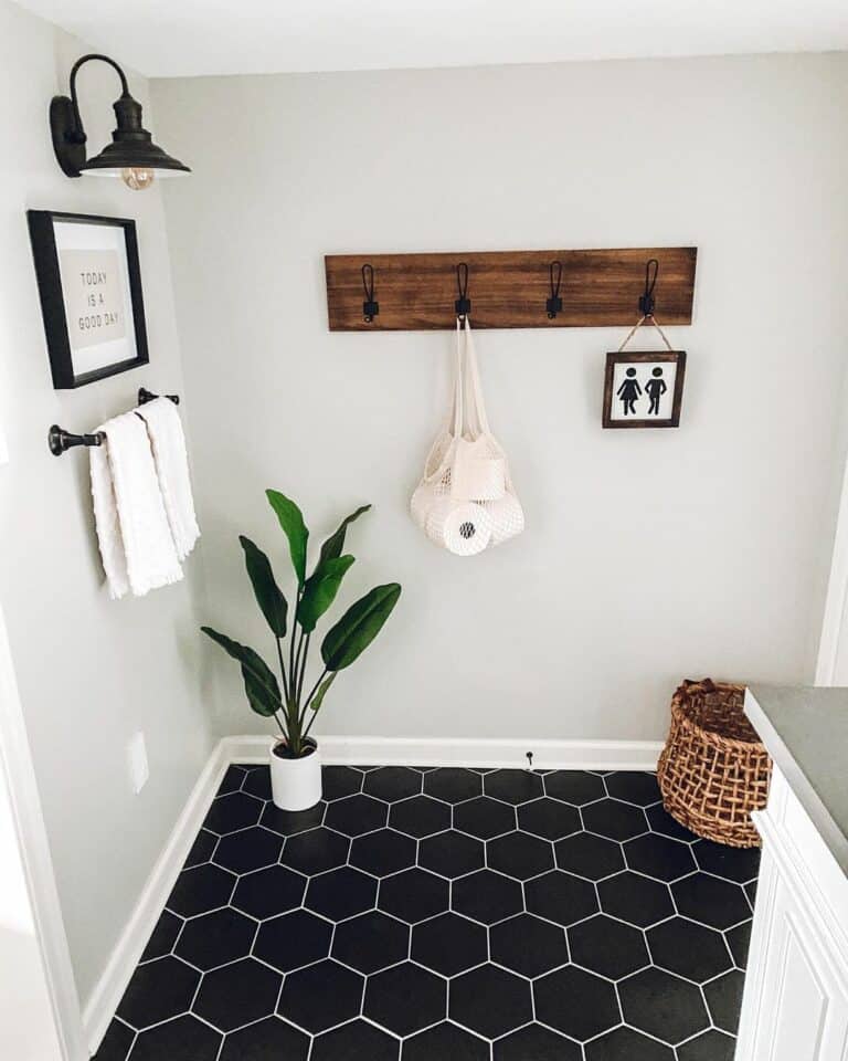 White Trim with Black Hexagon Tile Flooring