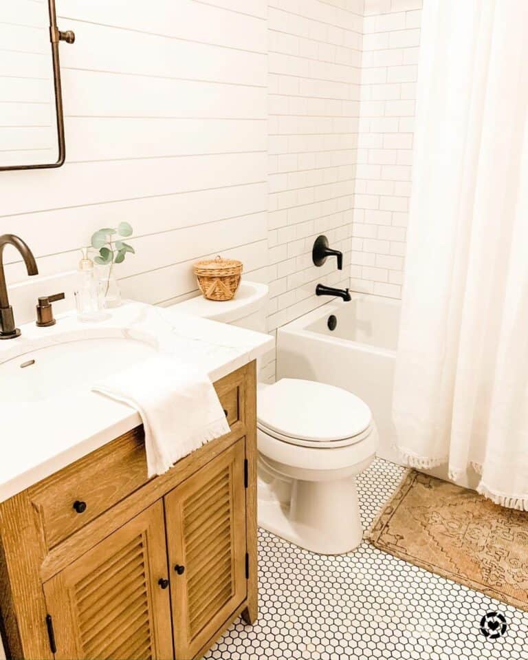 Wooden Vanity on Penny Tile Flooring