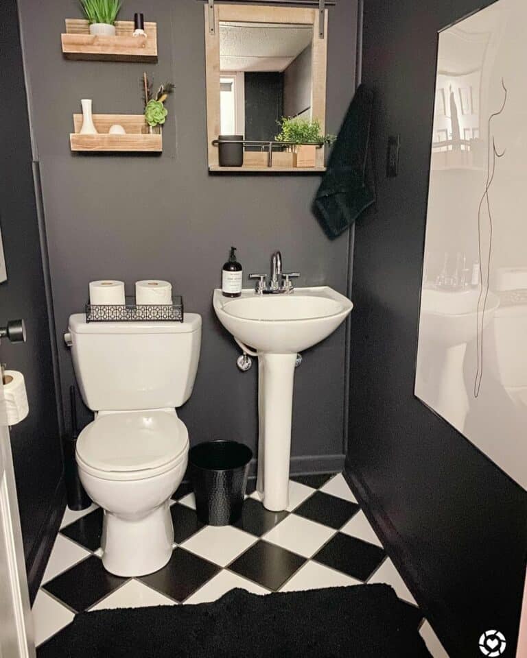 Pedestal Sink on Checkered Flooring
