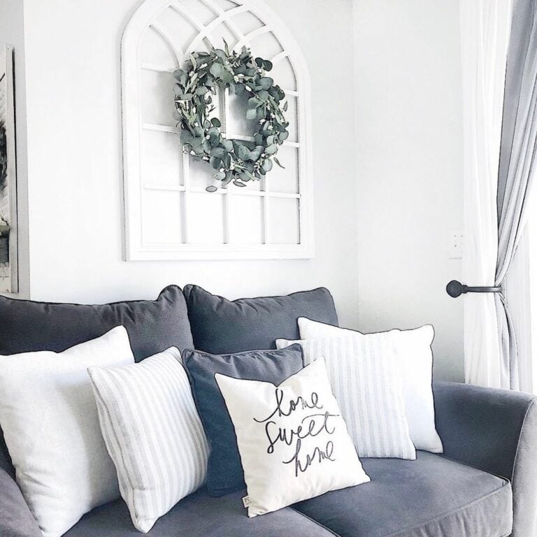 Moody Sofa Brightened by White Pillows
