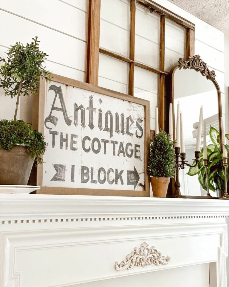 Differently Sized Frames as Mantel Décor