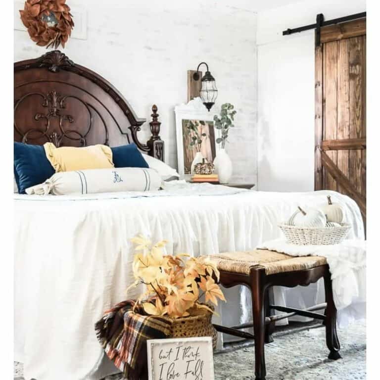 Dark Wood Headboard With Yellow and Blue Pillows
