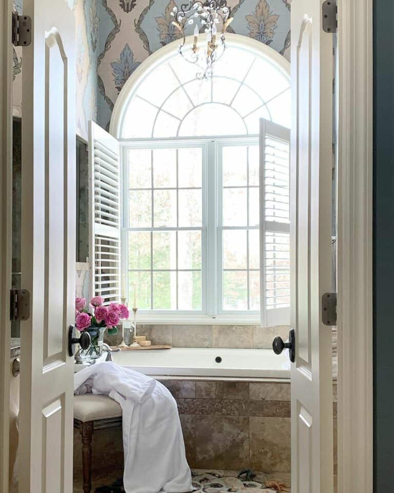 White Shutters Cover Luxurious Bathroom Windows