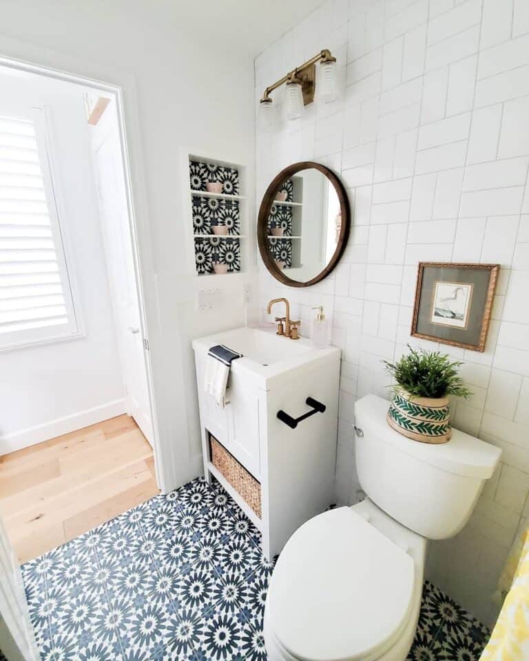 Half Bath with Mosaic Floor Tiles