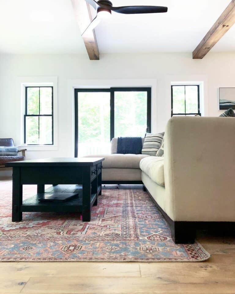 Vintage Rug Lays Beneath Sofa