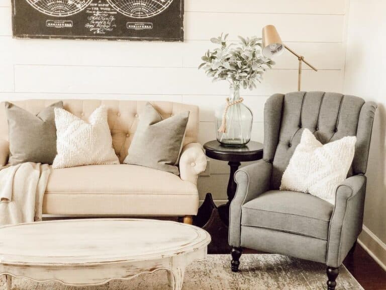 Gray Tufted Armchair with Gold Standing Lamp