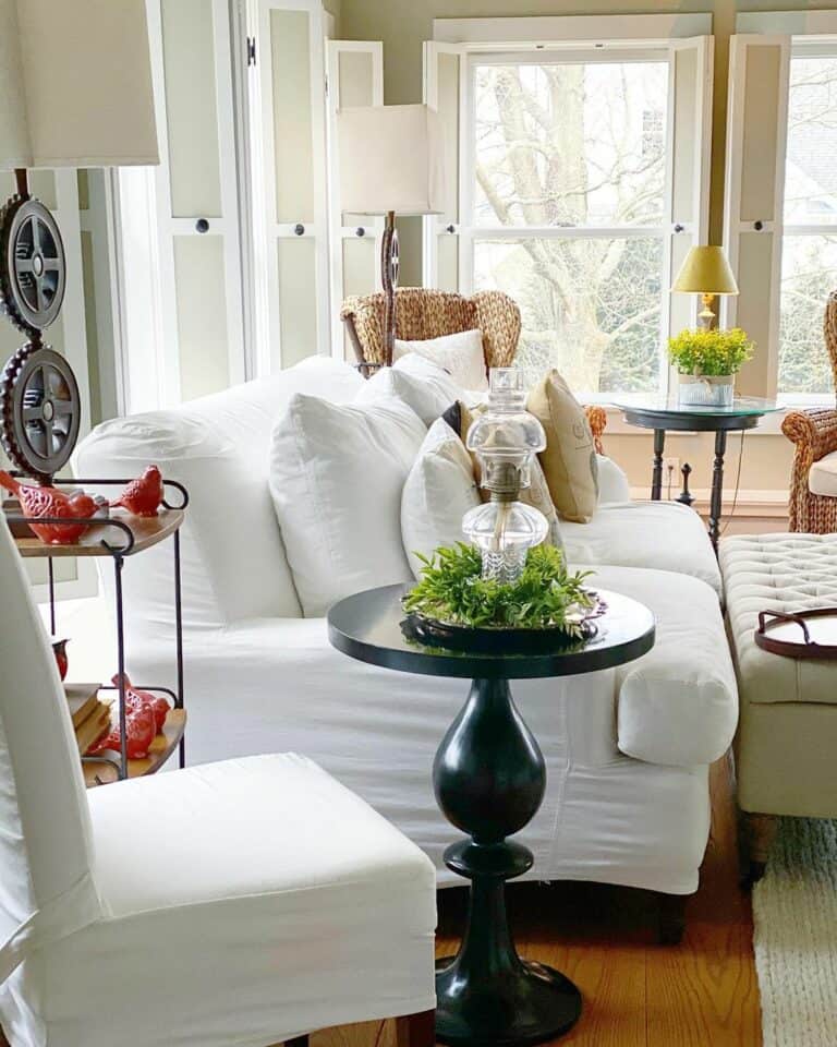 Round Black Table and a Knit White Rug