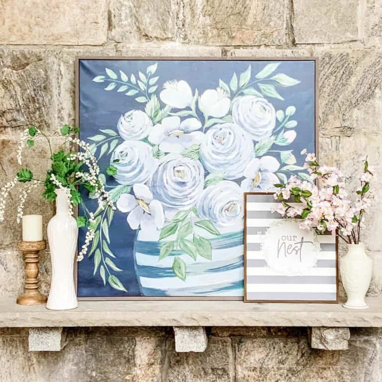 Navy Décor on a Stone Fireplace Shelf