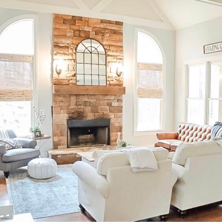 Tan Dry Stacked Stone Fireplace with Wood Mantel