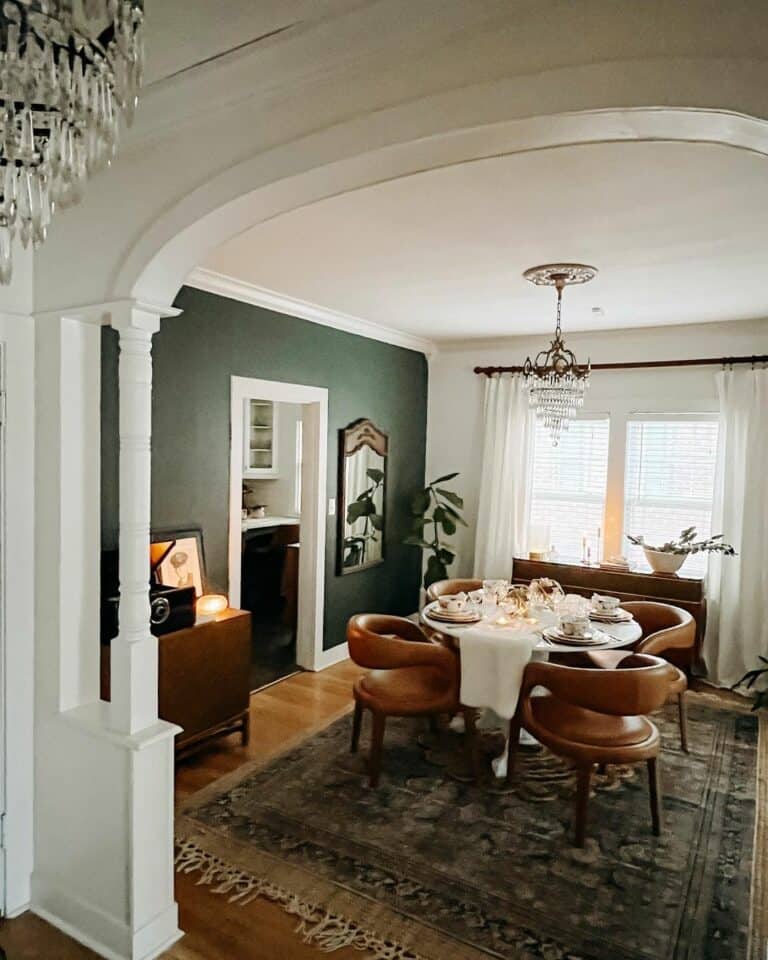 Emerald Green Wall and Brown Leather Chairs
