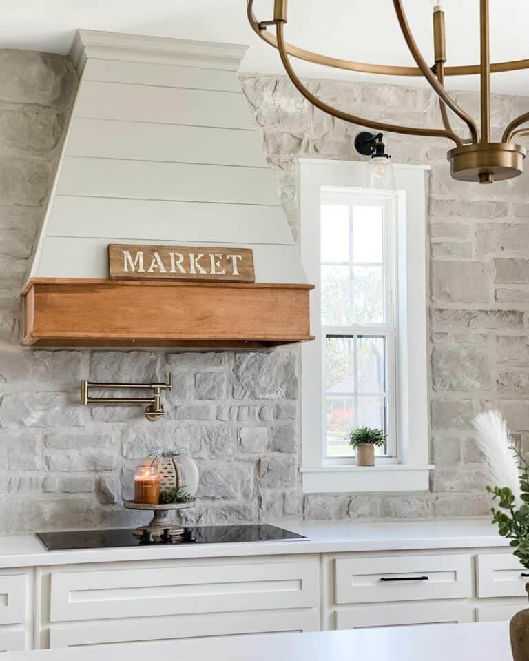 Stone Walls Feature a Shiplap Hood