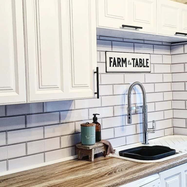 Wood Countertop Mingles with White Cabinets
