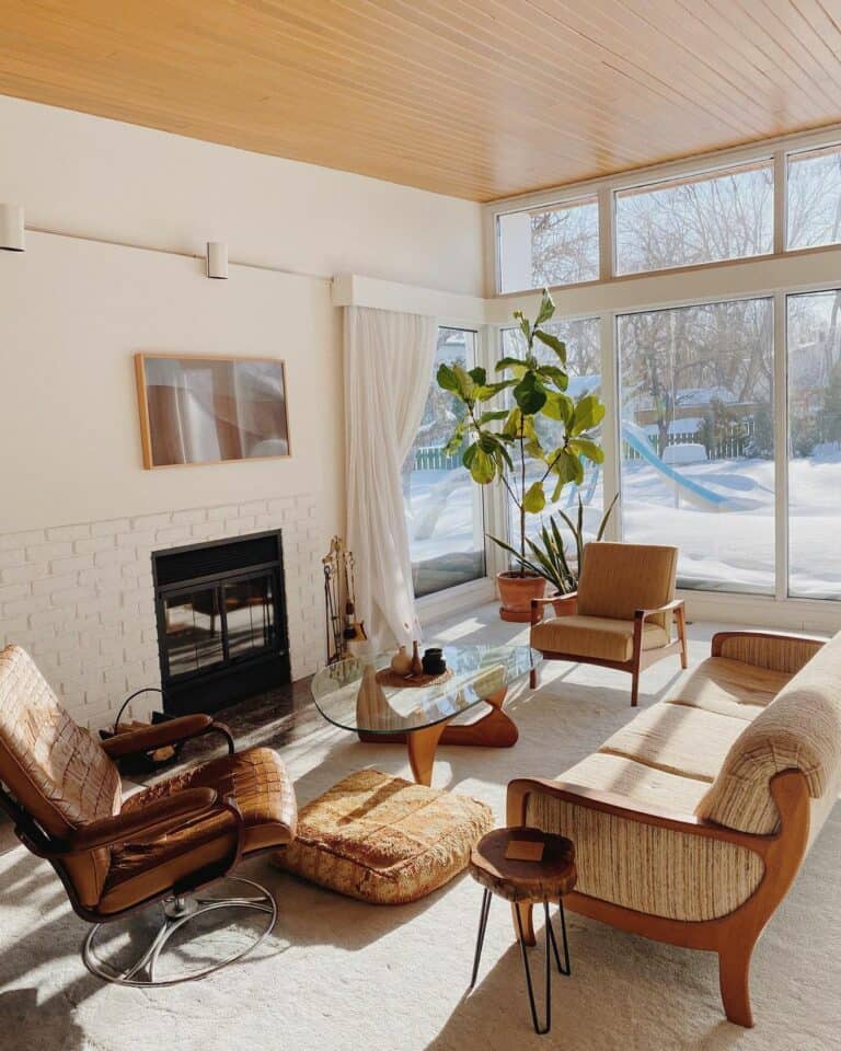 Wall of Windows Illuminates Bohemian Living Room