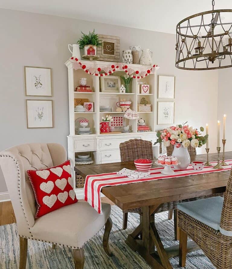 White China Hutch Filled With Red Decor