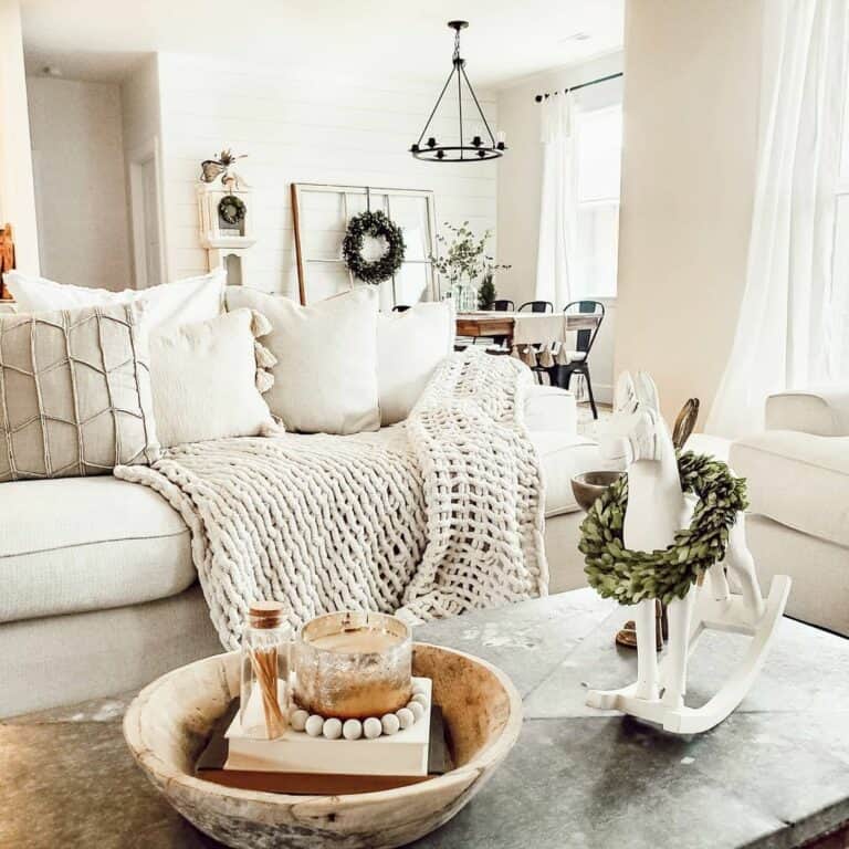 Elegant Farmhouse Living Room With Neutral and Rustic Accents