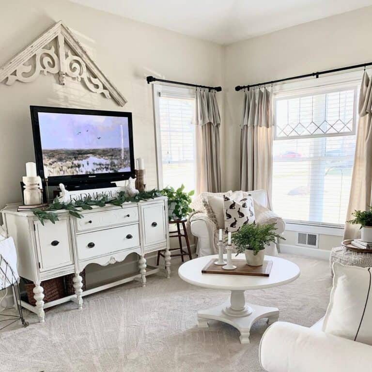 White Wall Decor on an Off-White Living Room Wall